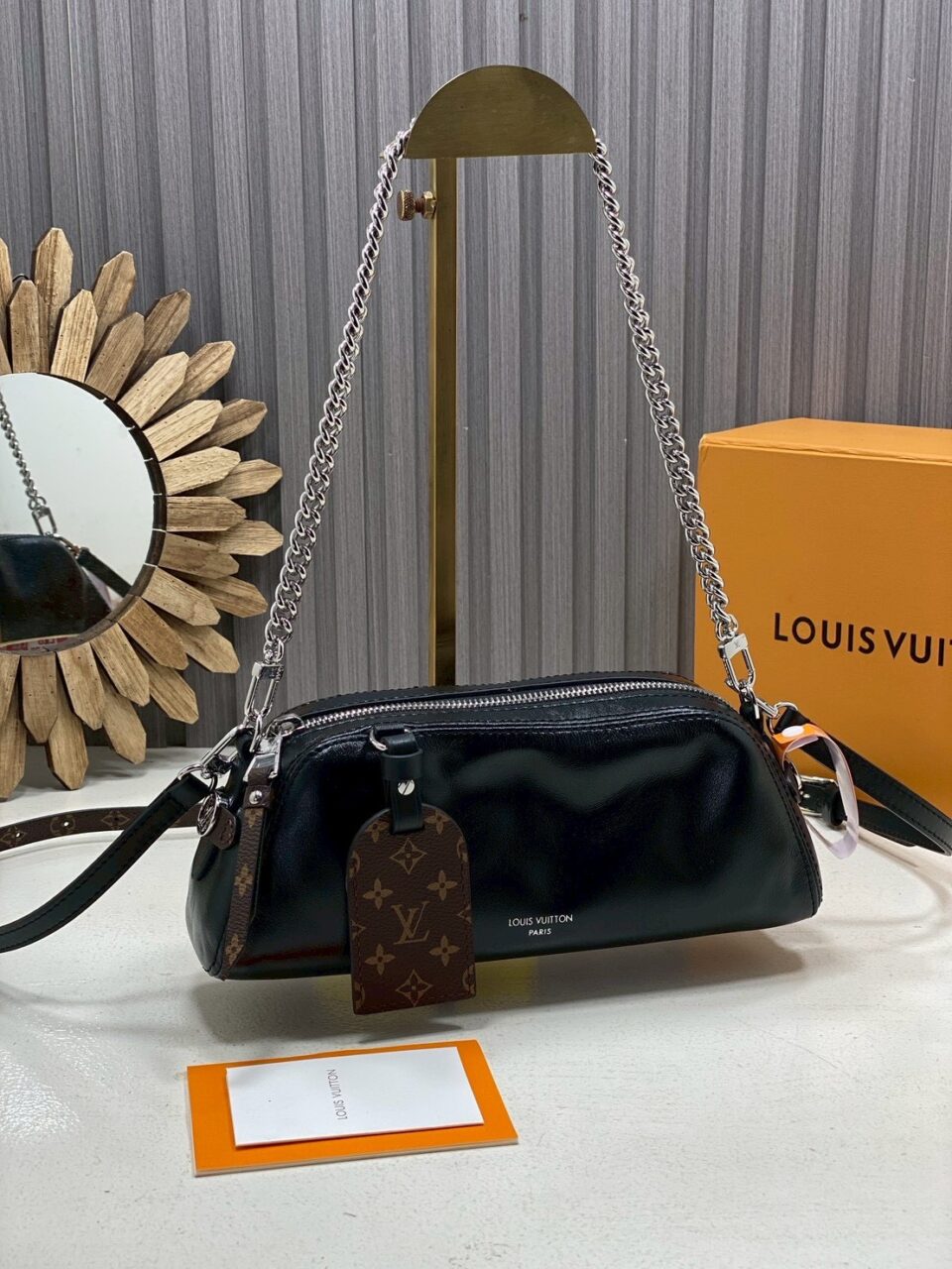 Louis Vuitton Pochette Vibe in black