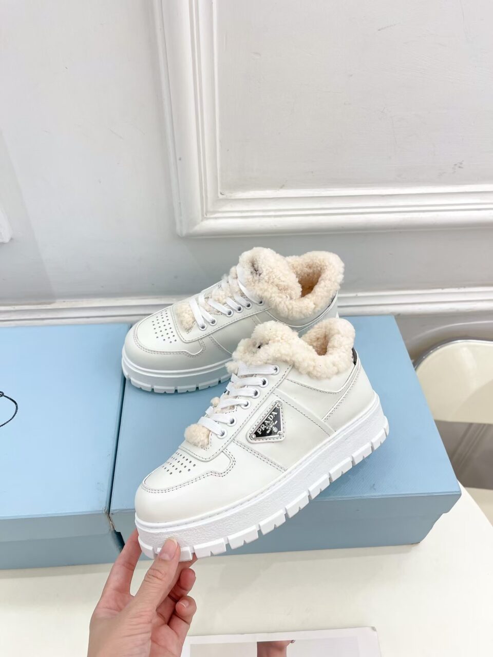 Prada Leather Shearling Platform Sneakers