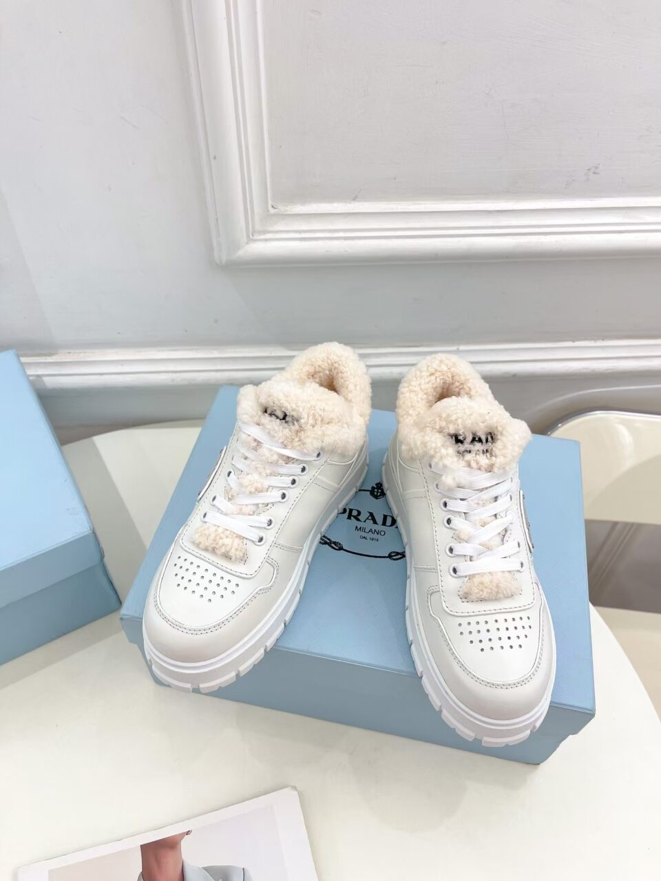 Prada Leather Shearling Platform Sneakers