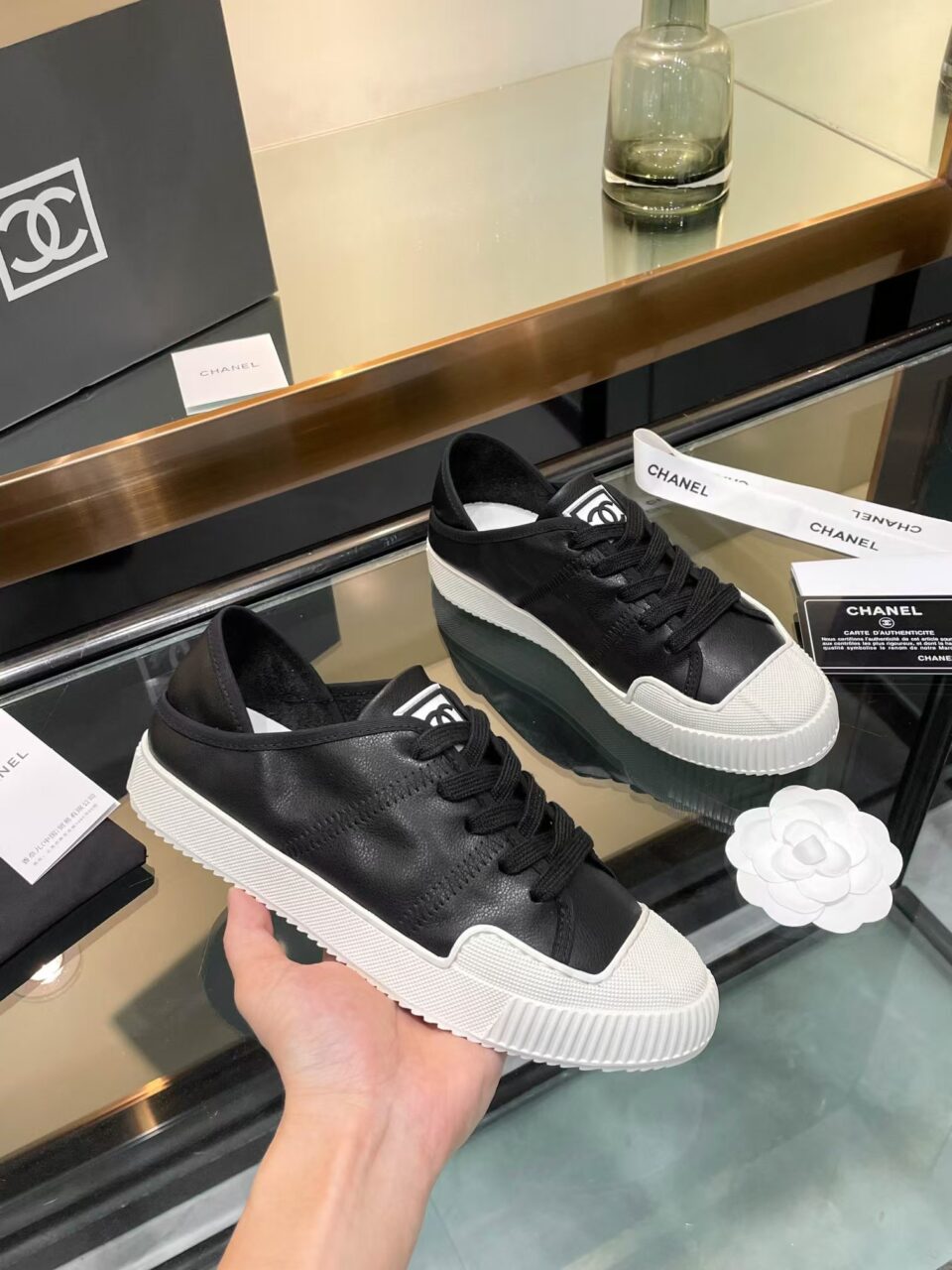 Chanel CASUAL SHOES IN BLACK MIX WHITE LAMBSKIN