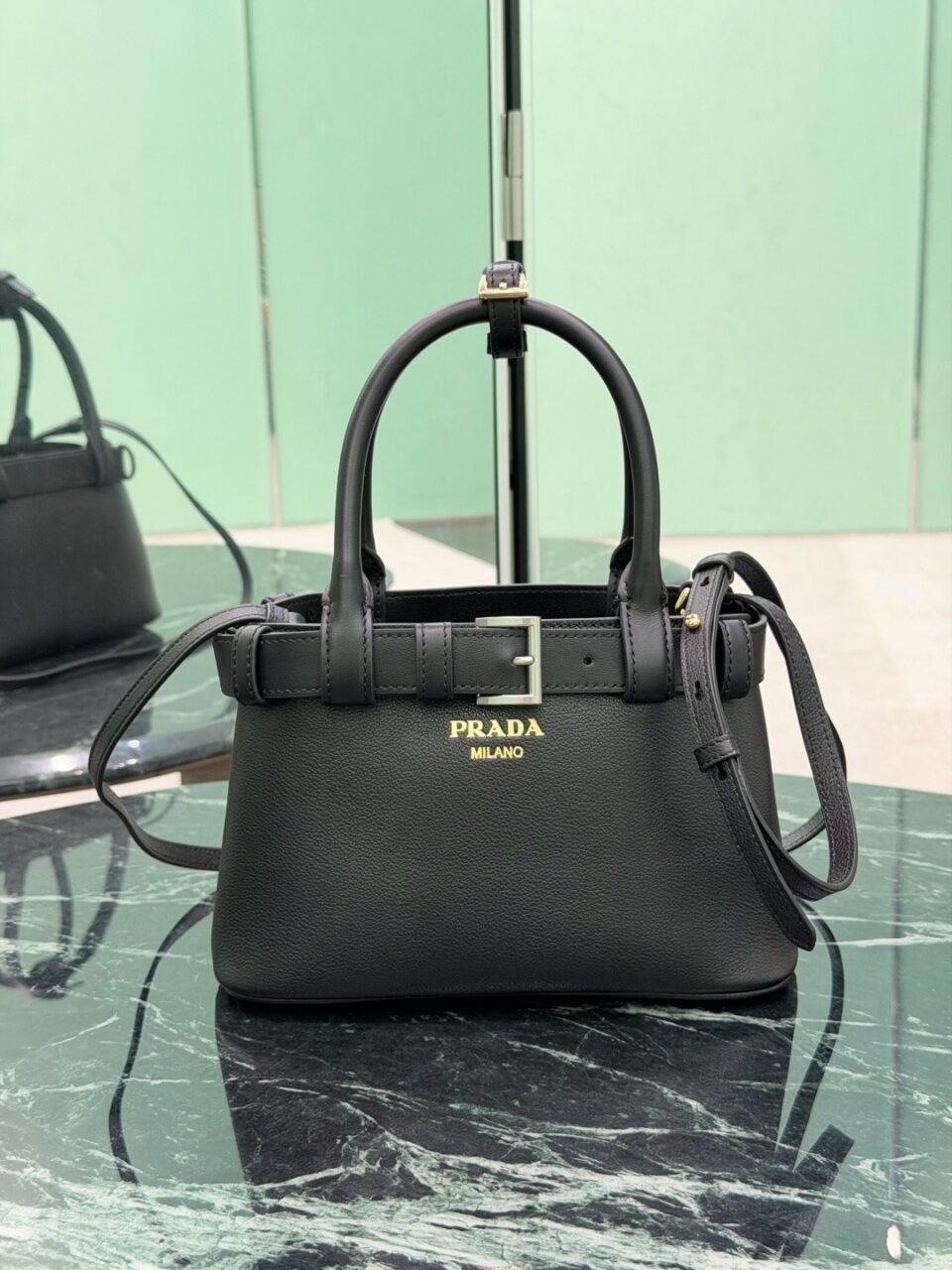 Prada Small Buckle Leather Top Handle Bag