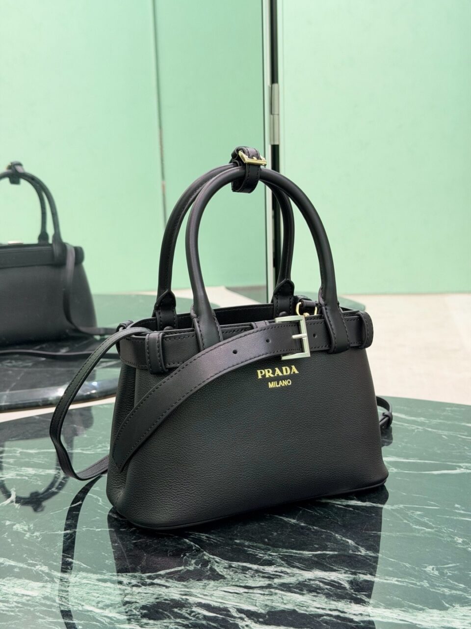 Prada Small Buckle Leather Top Handle Bag